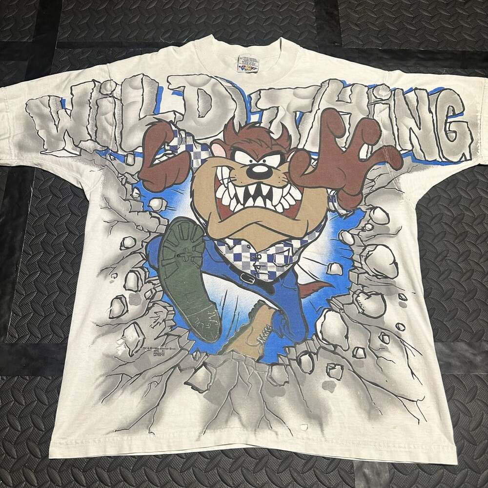 Vintage distressed 1996 Looney Tunes Taz Wild Thing All Over Print T-Shirt